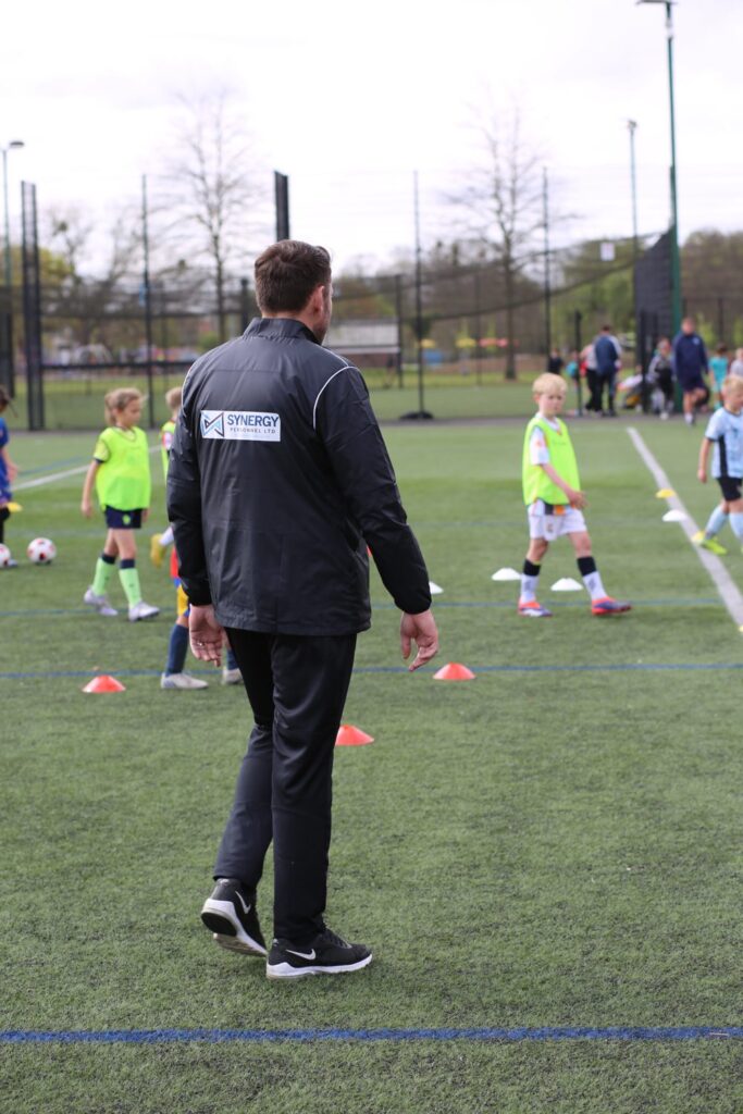 A coach directing players